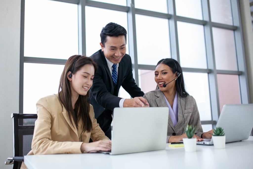 Supervisors teach work to employees in the office, Business concept.